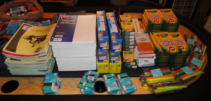 table full of school supplies