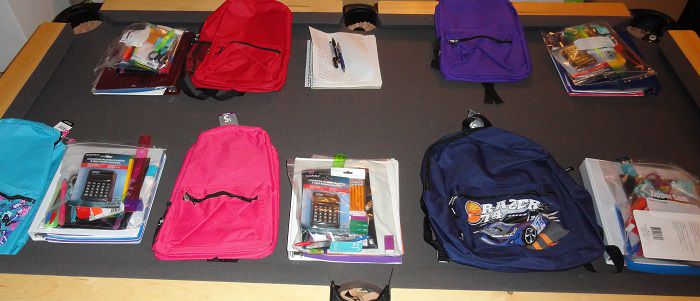 table full of school supplies
